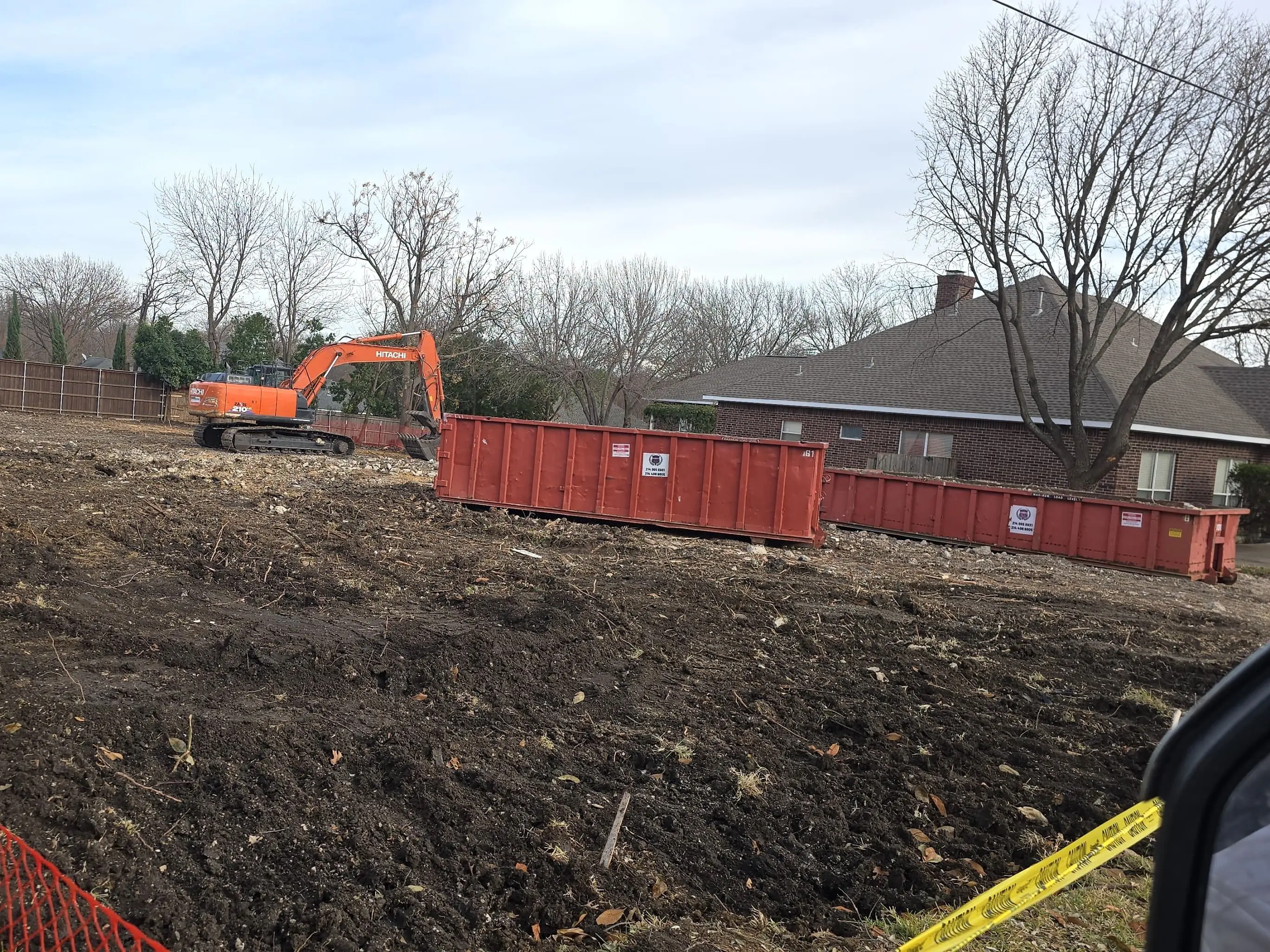 Site work — graded, fenced and ready to rebuild